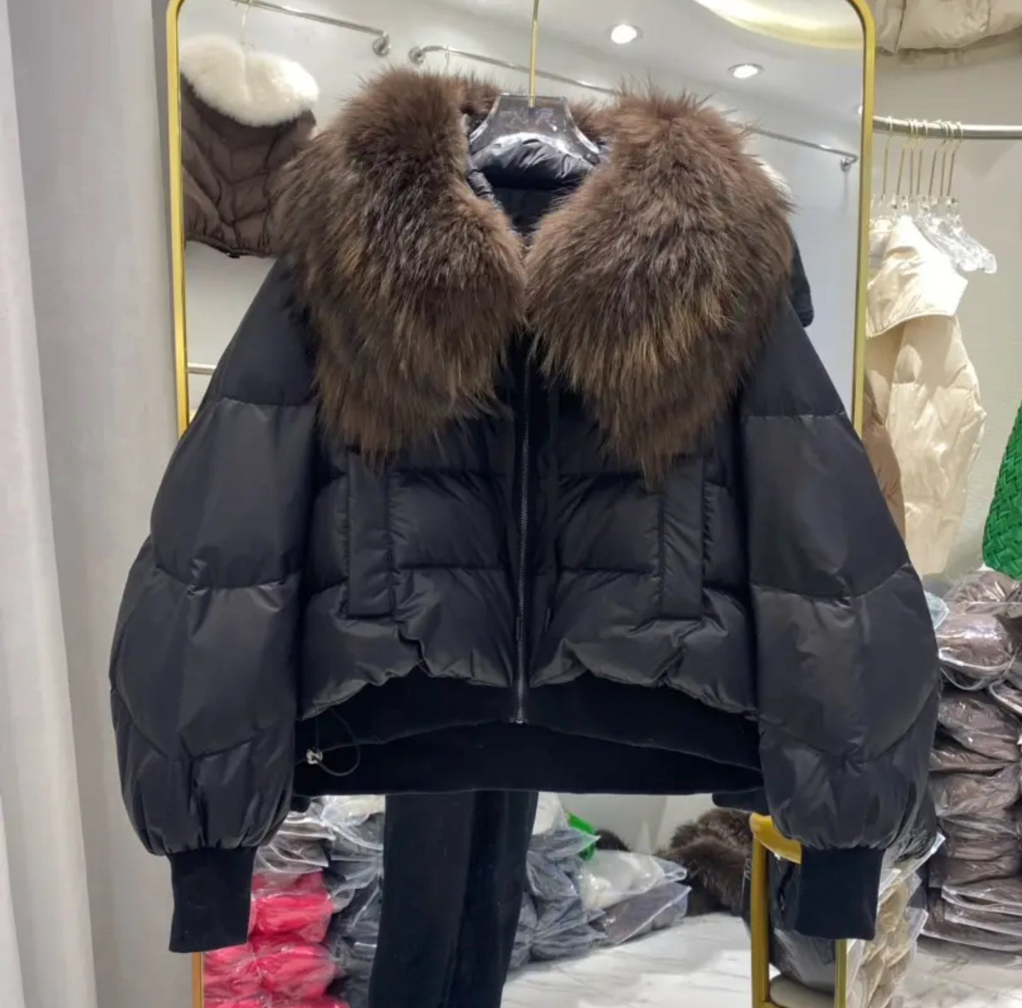 Luxury fur collar puffer coats .