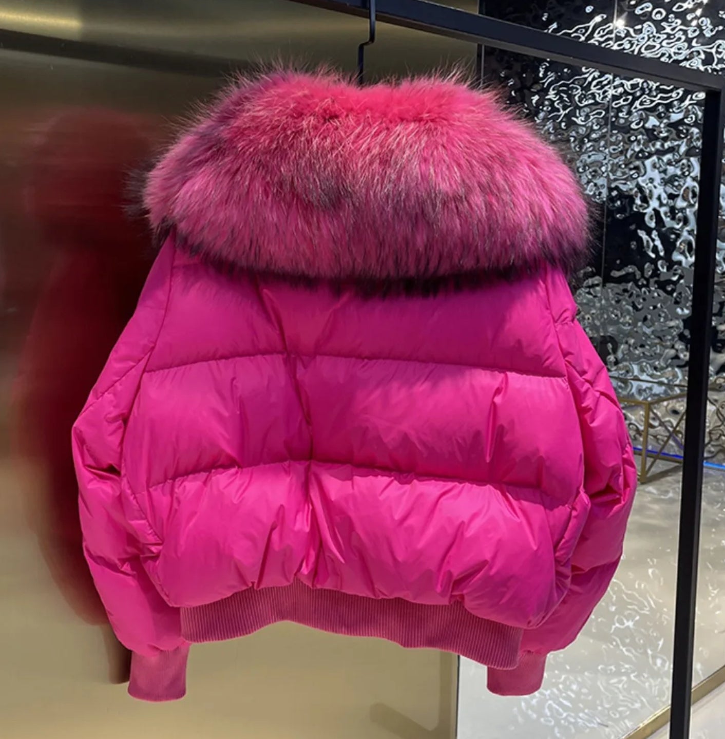 Luxury fur collar puffer coats .