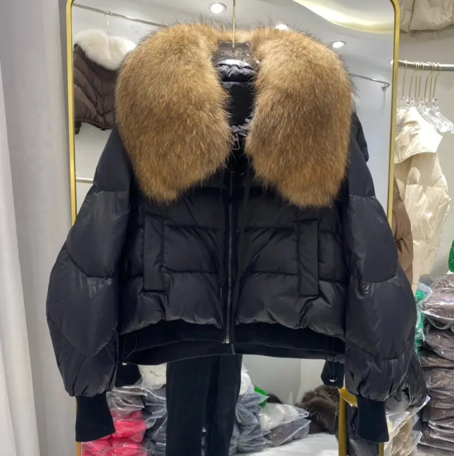 Luxury fur collar puffer coats .