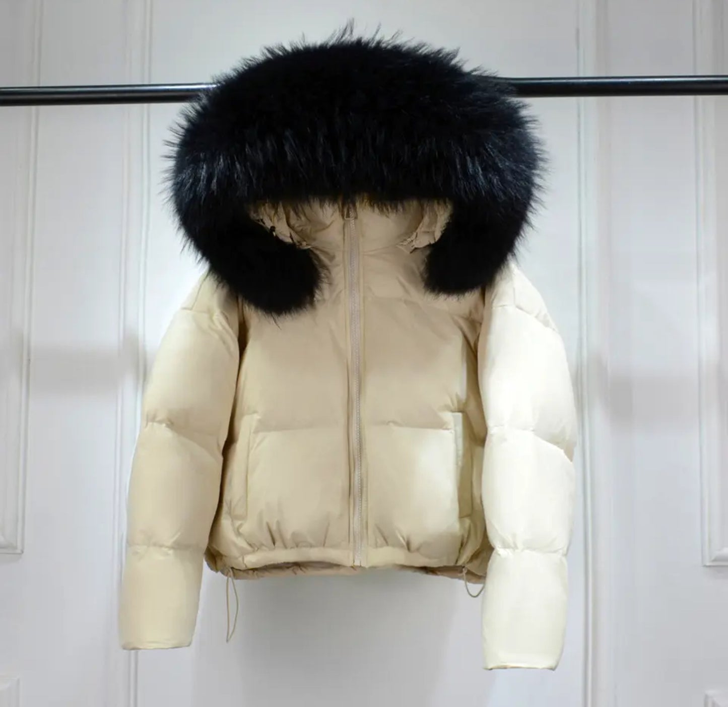 Luxury fur puffer coats .