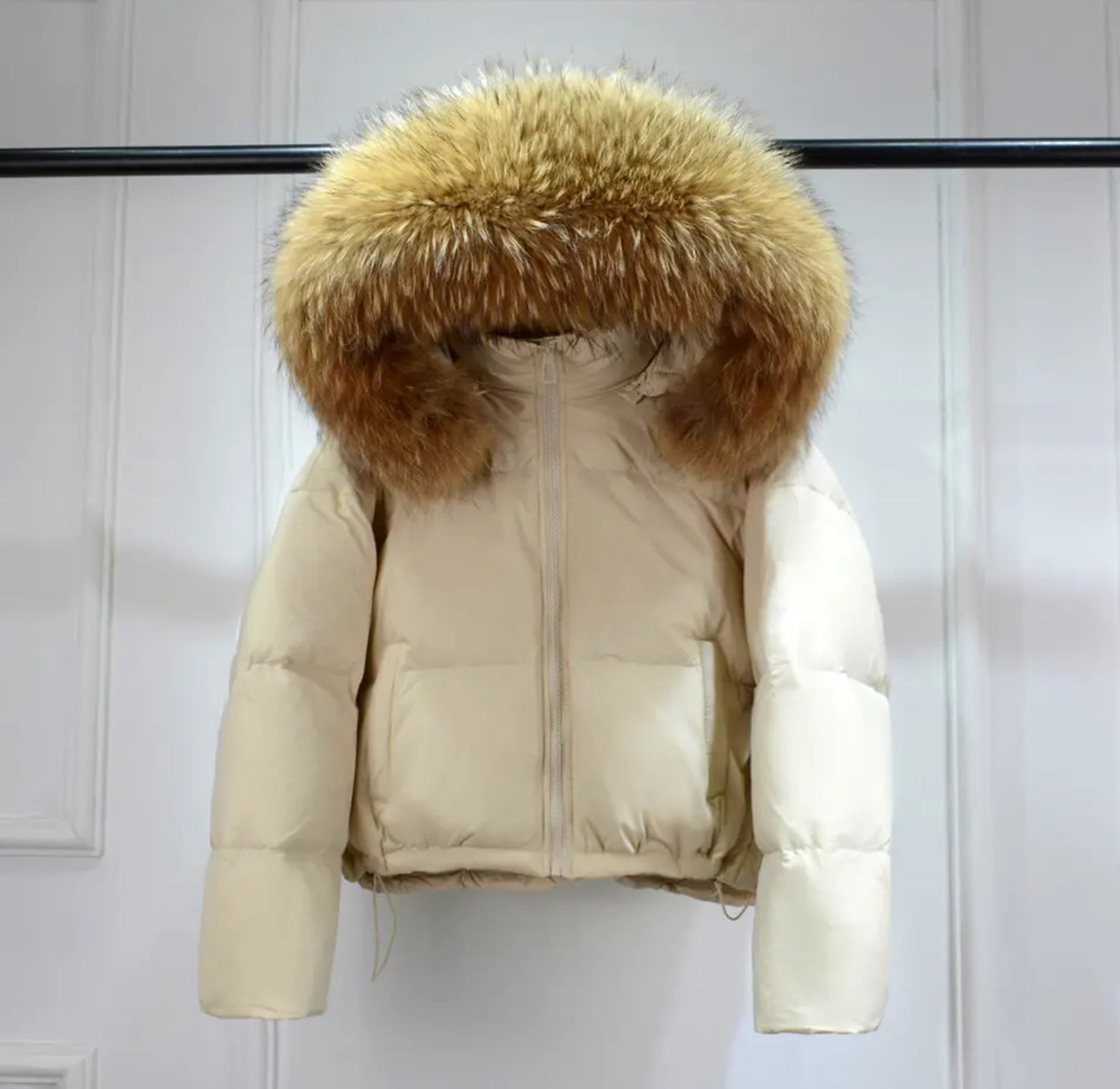 Luxury fur puffer coats .