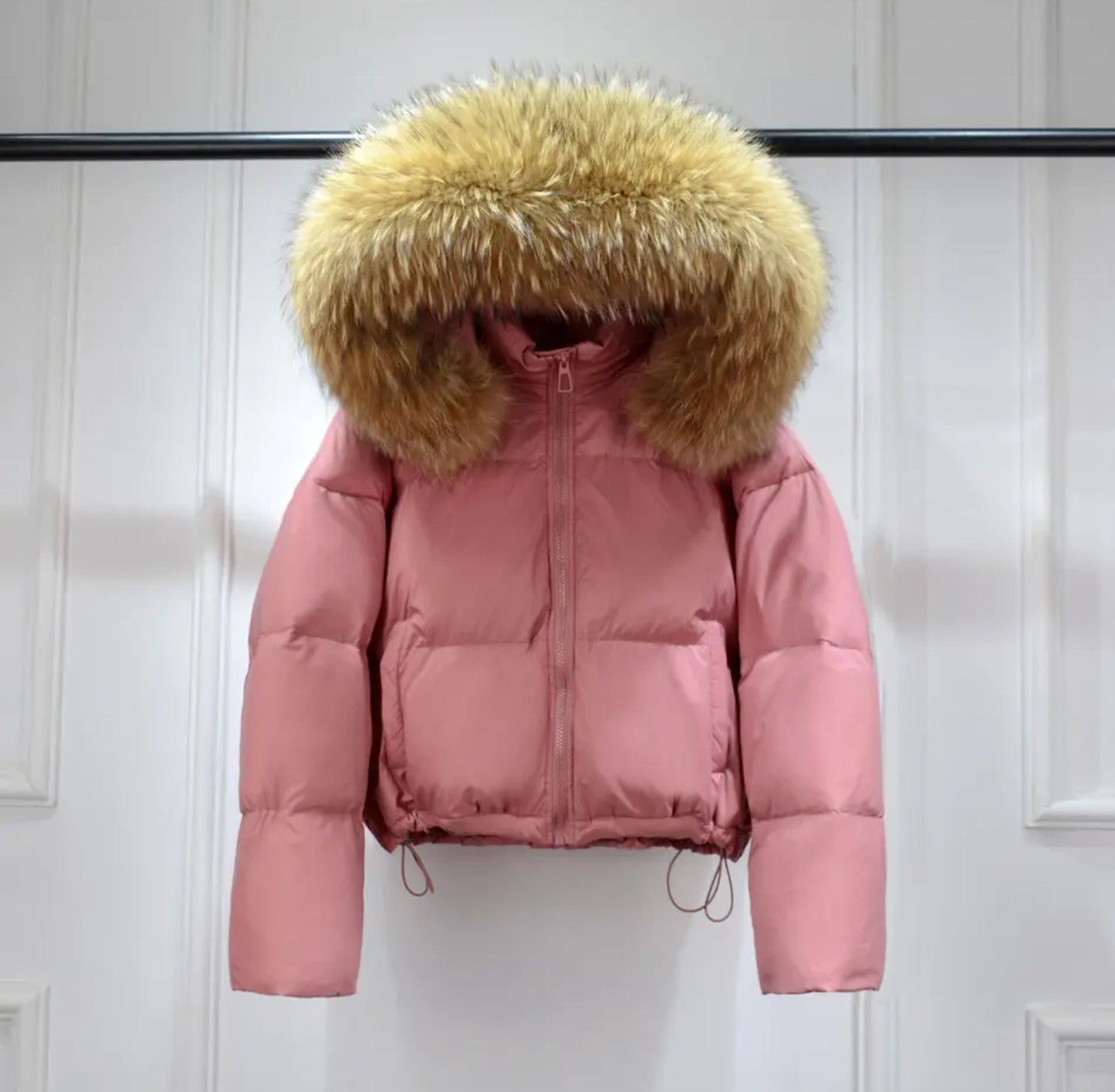 Luxury fur puffer coats .