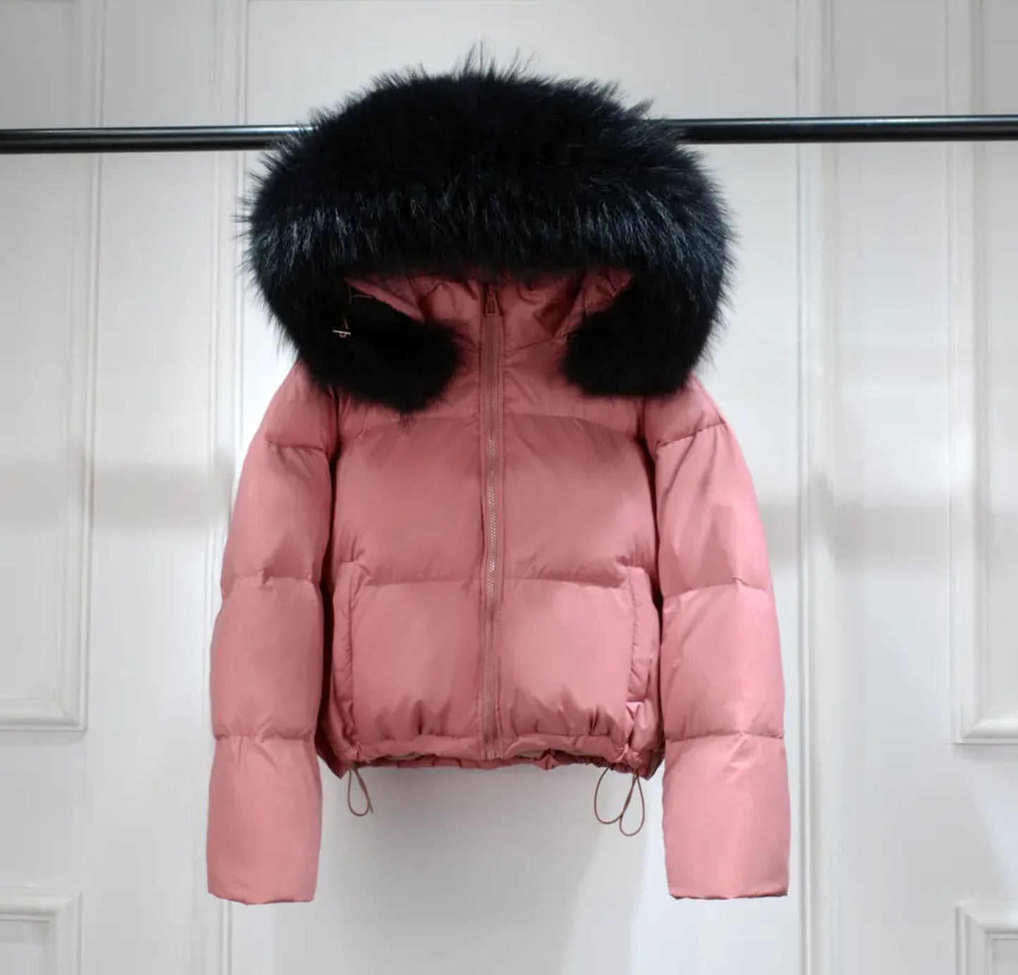 Luxury fur puffer coats .