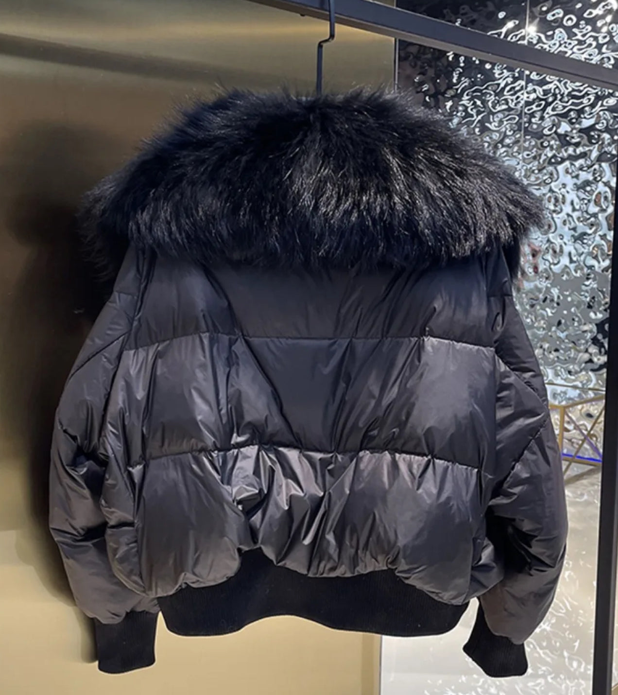 Luxury fur collar puffer coats .