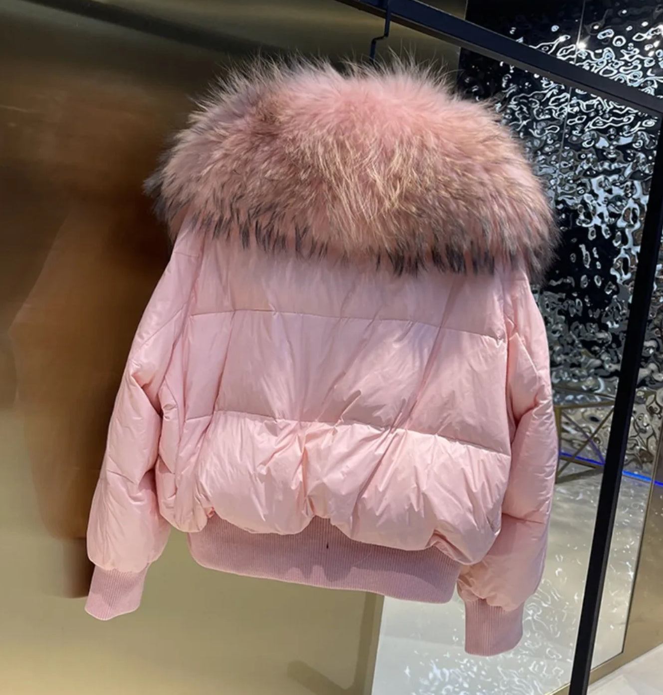 Luxury fur collar puffer coats .