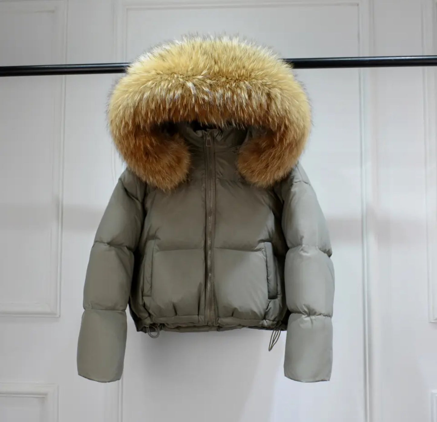 Luxury fur puffer coats .