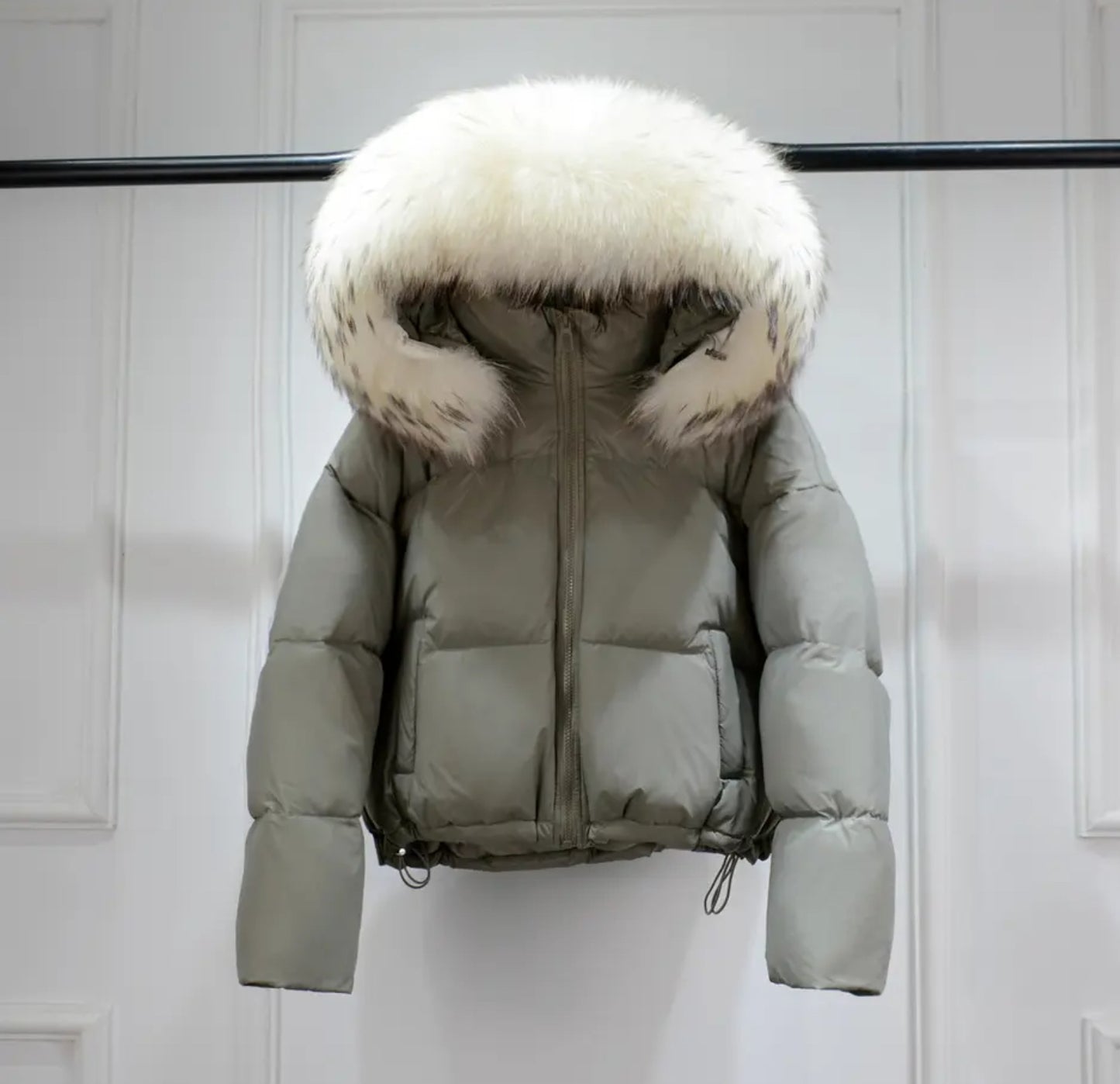 Luxury fur puffer coats .