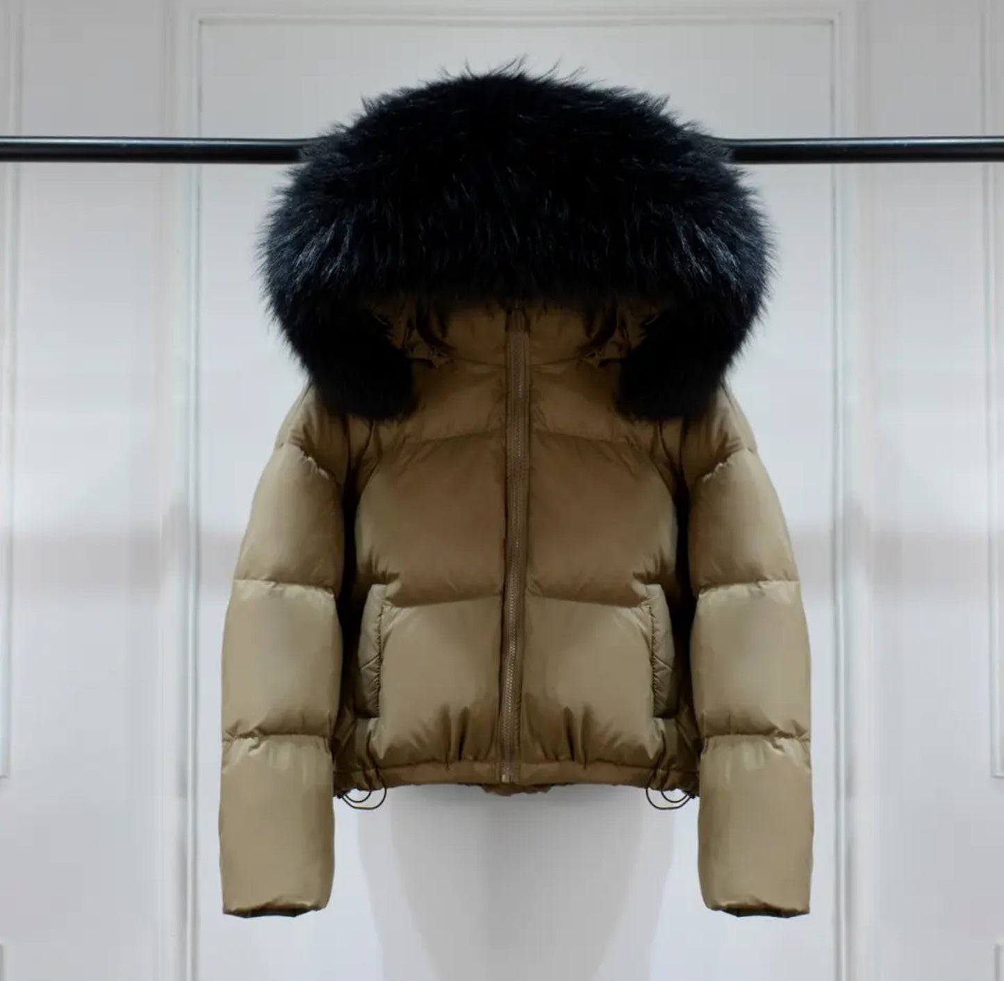 Luxury fur puffer coats .