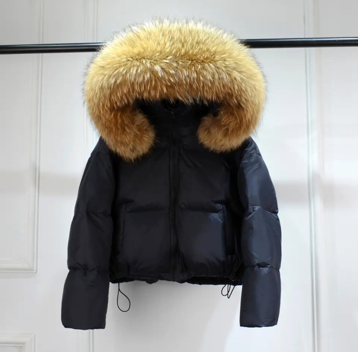 Luxury fur puffer coats .