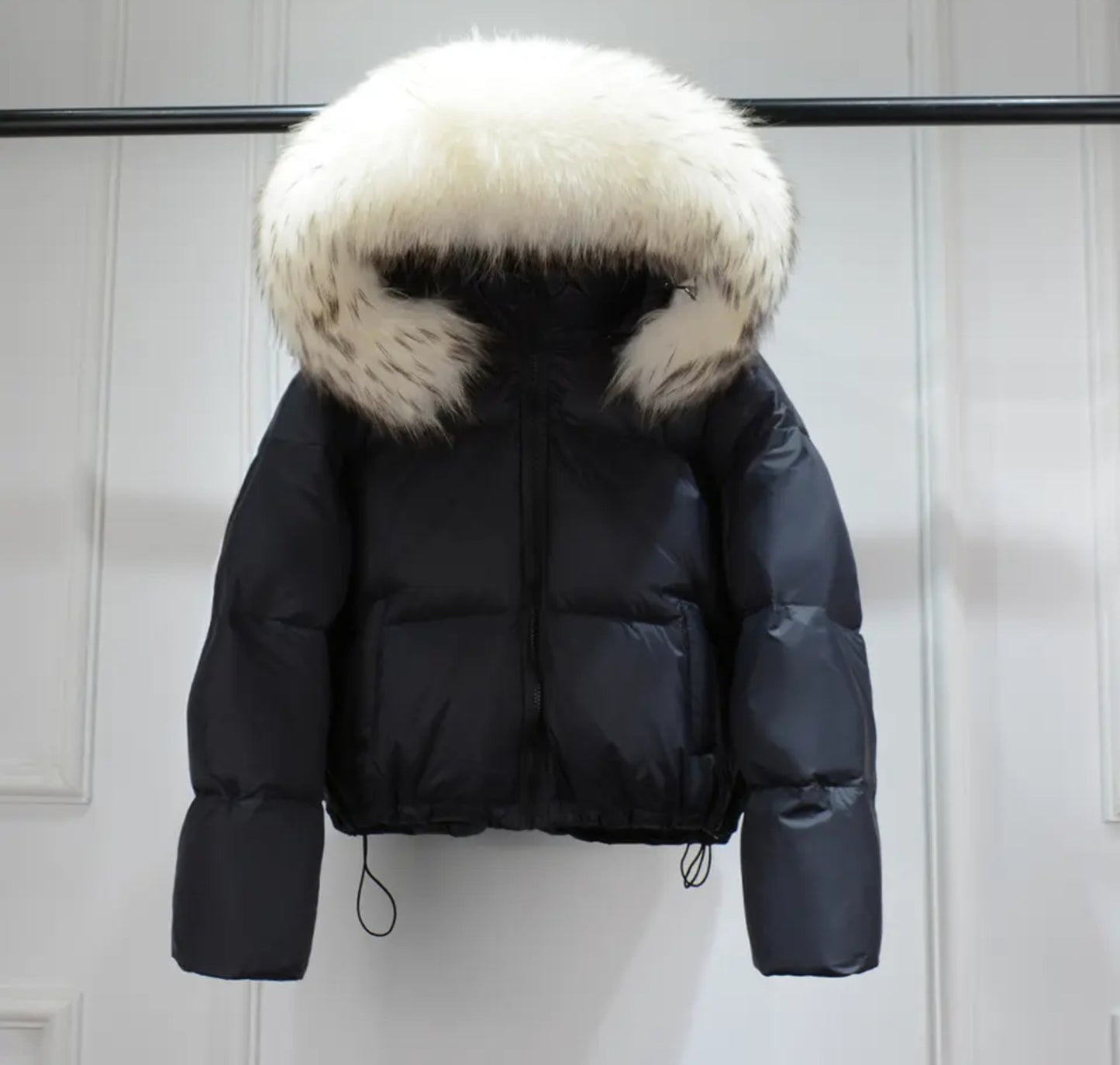 Luxury fur puffer coats .