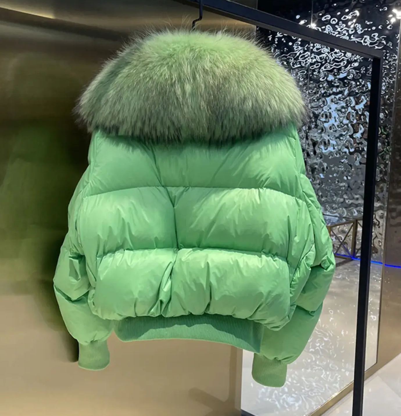 Luxury fur collar puffer coats .