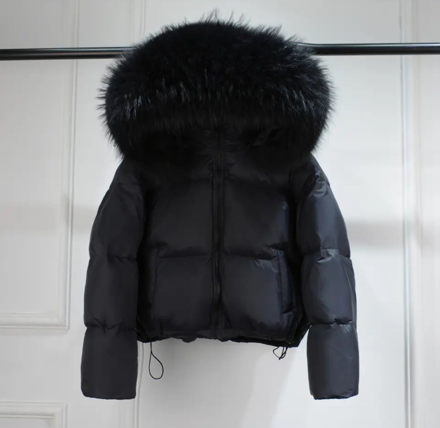 Luxury fur puffer coats .