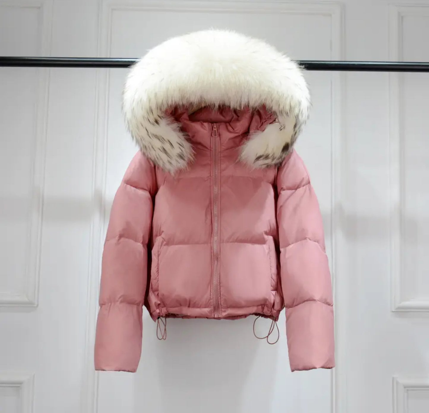 Luxury fur puffer coats .