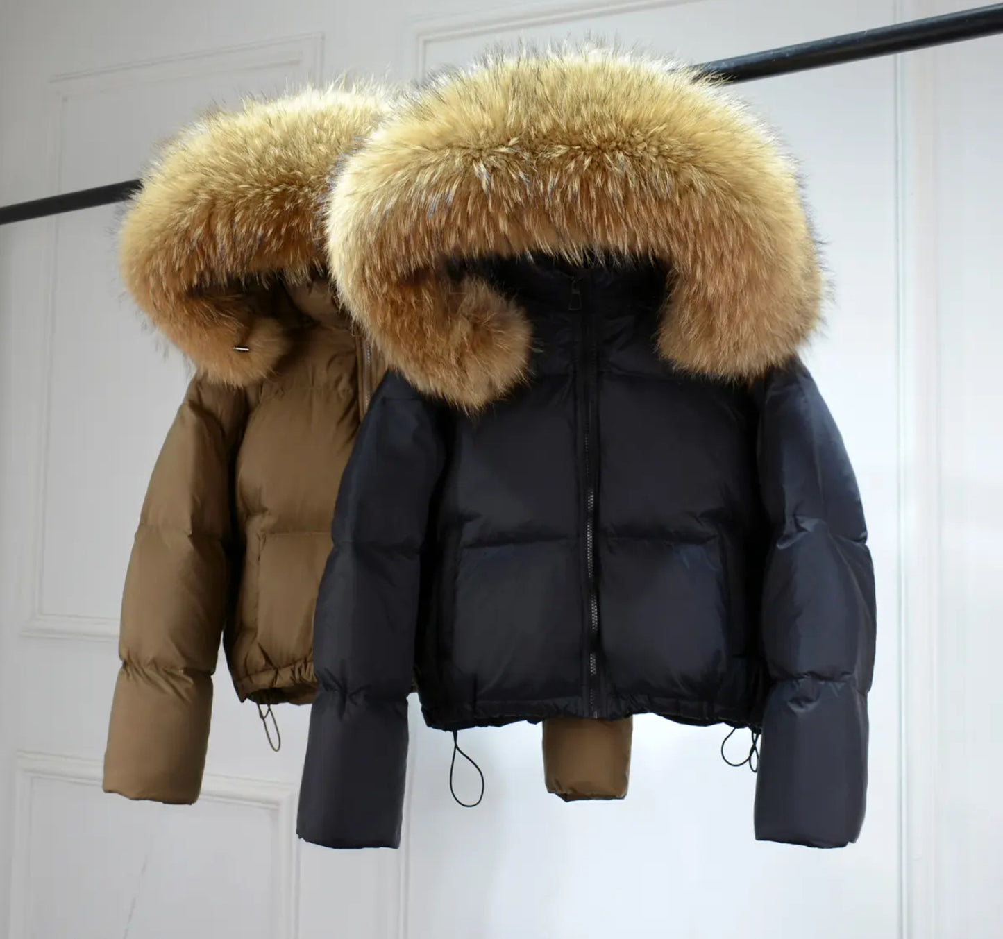 Luxury fur puffer coats .