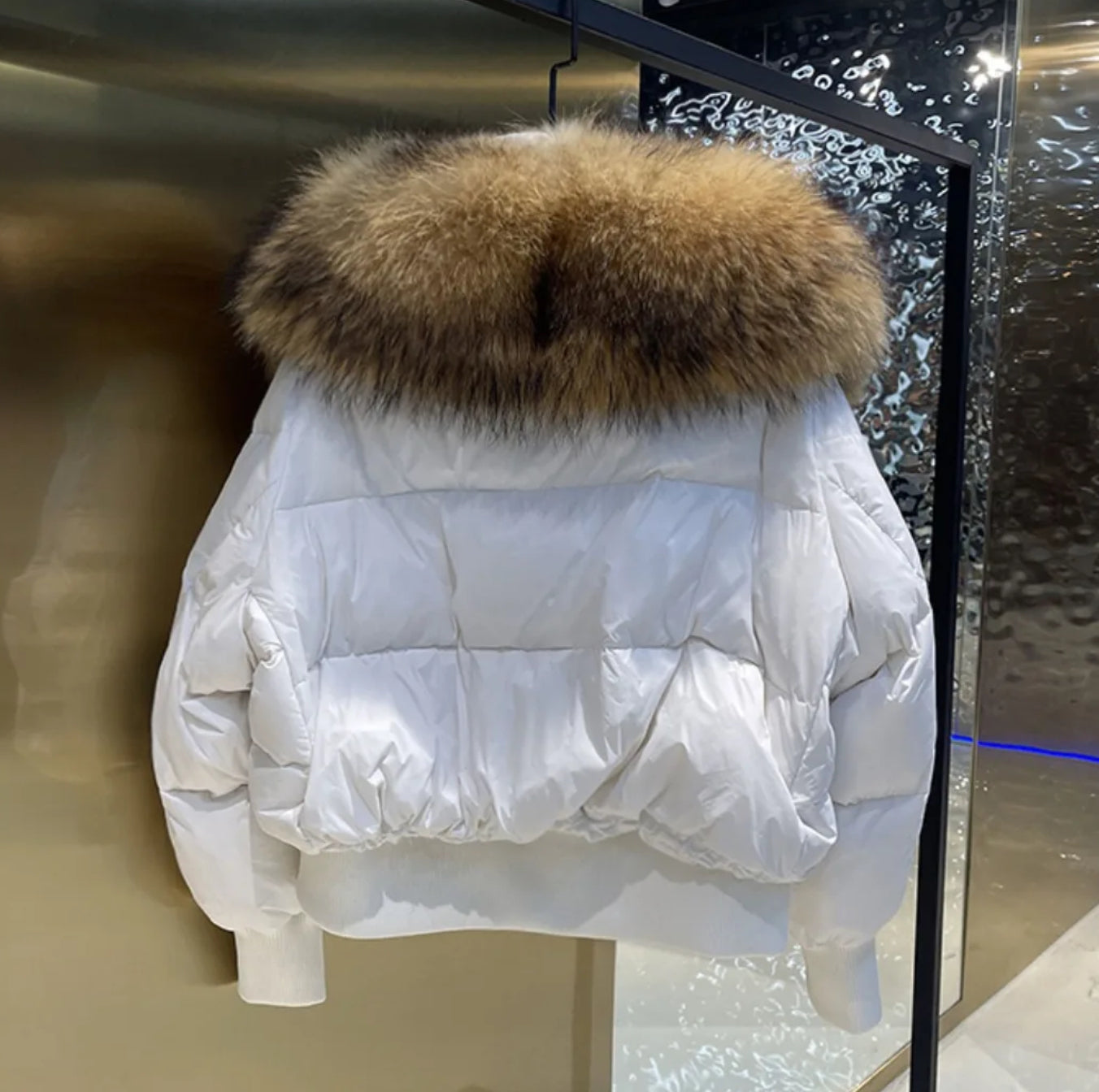 Luxury fur collar puffer coats .