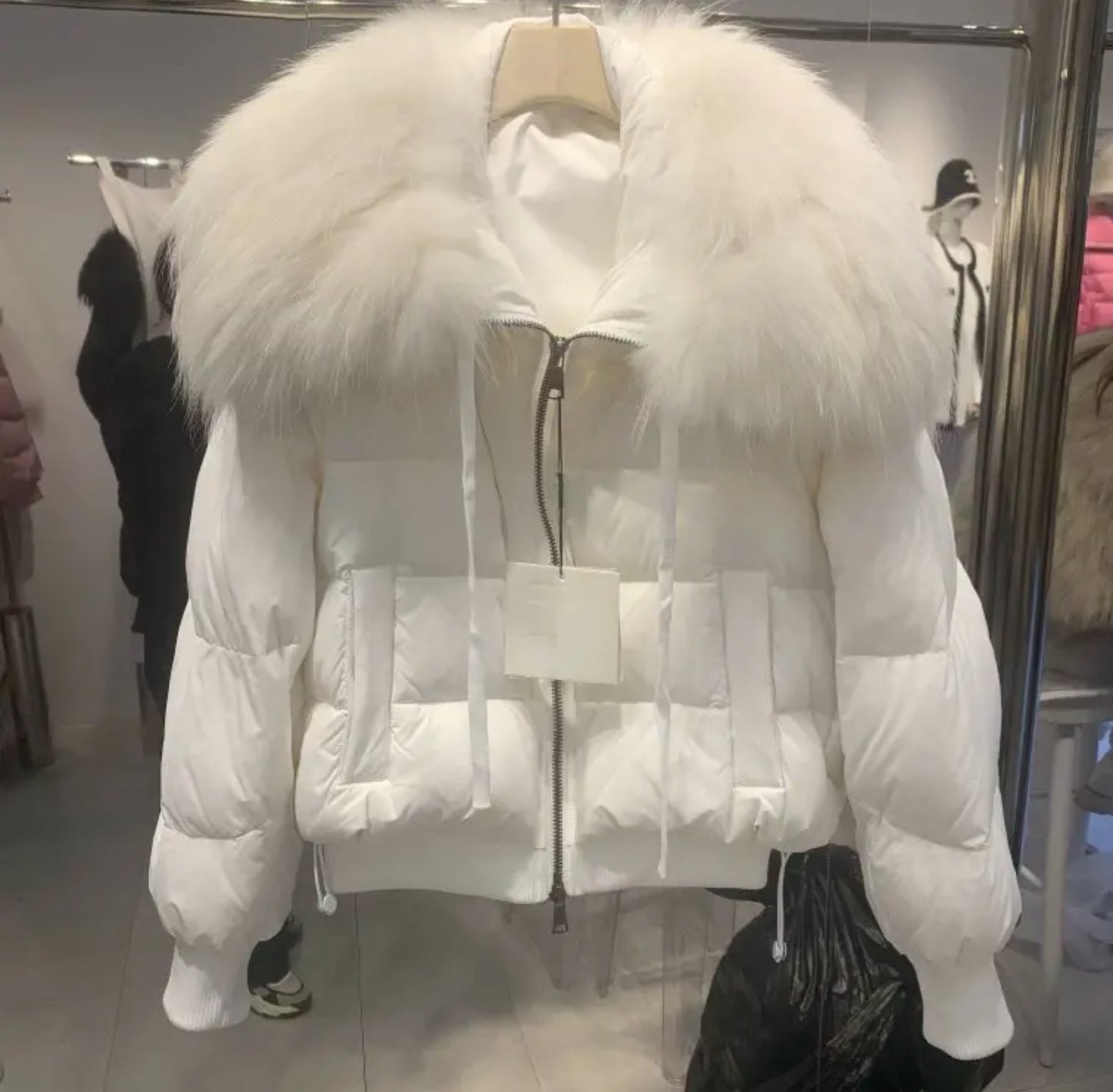 Luxury fur collar puffer coats .