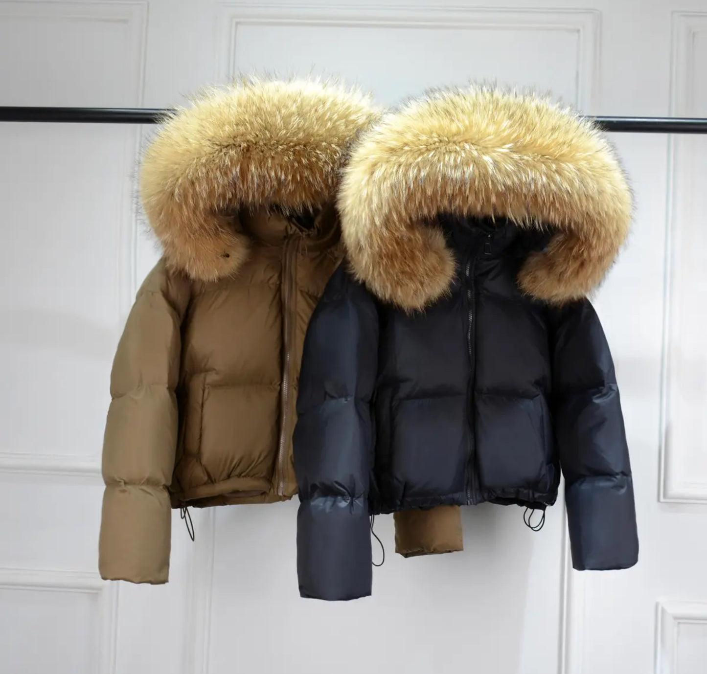 Luxury fur puffer coats .