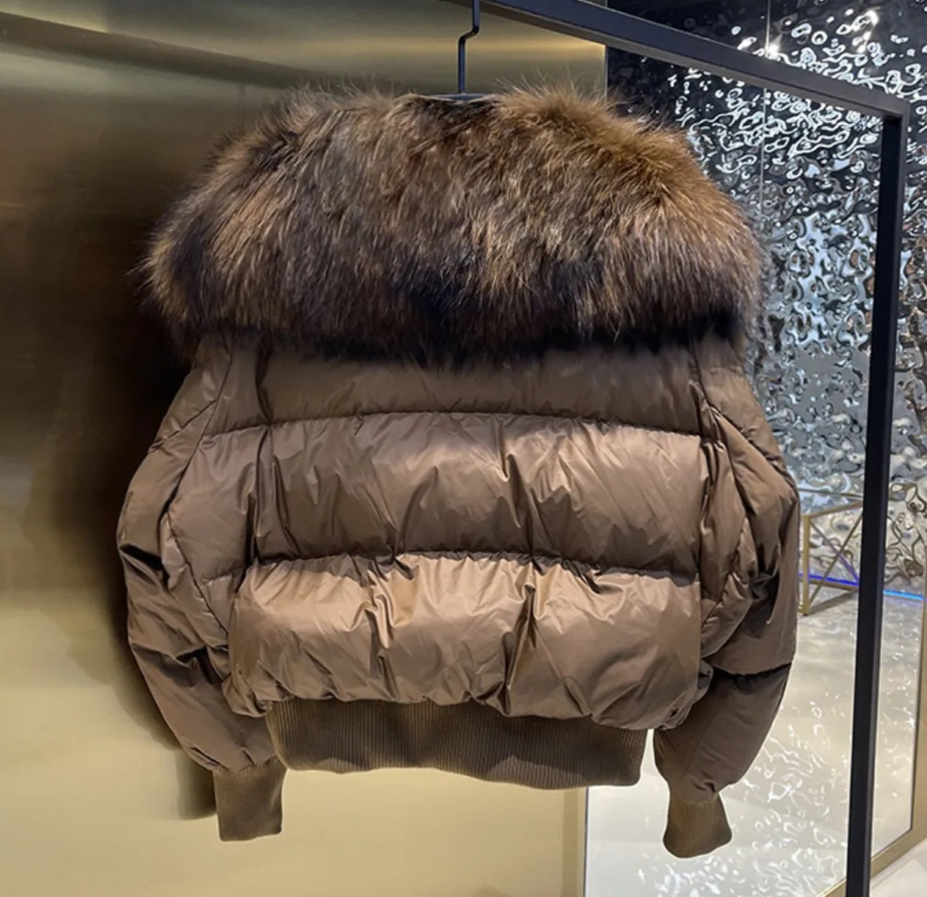 Luxury fur collar puffer coats .