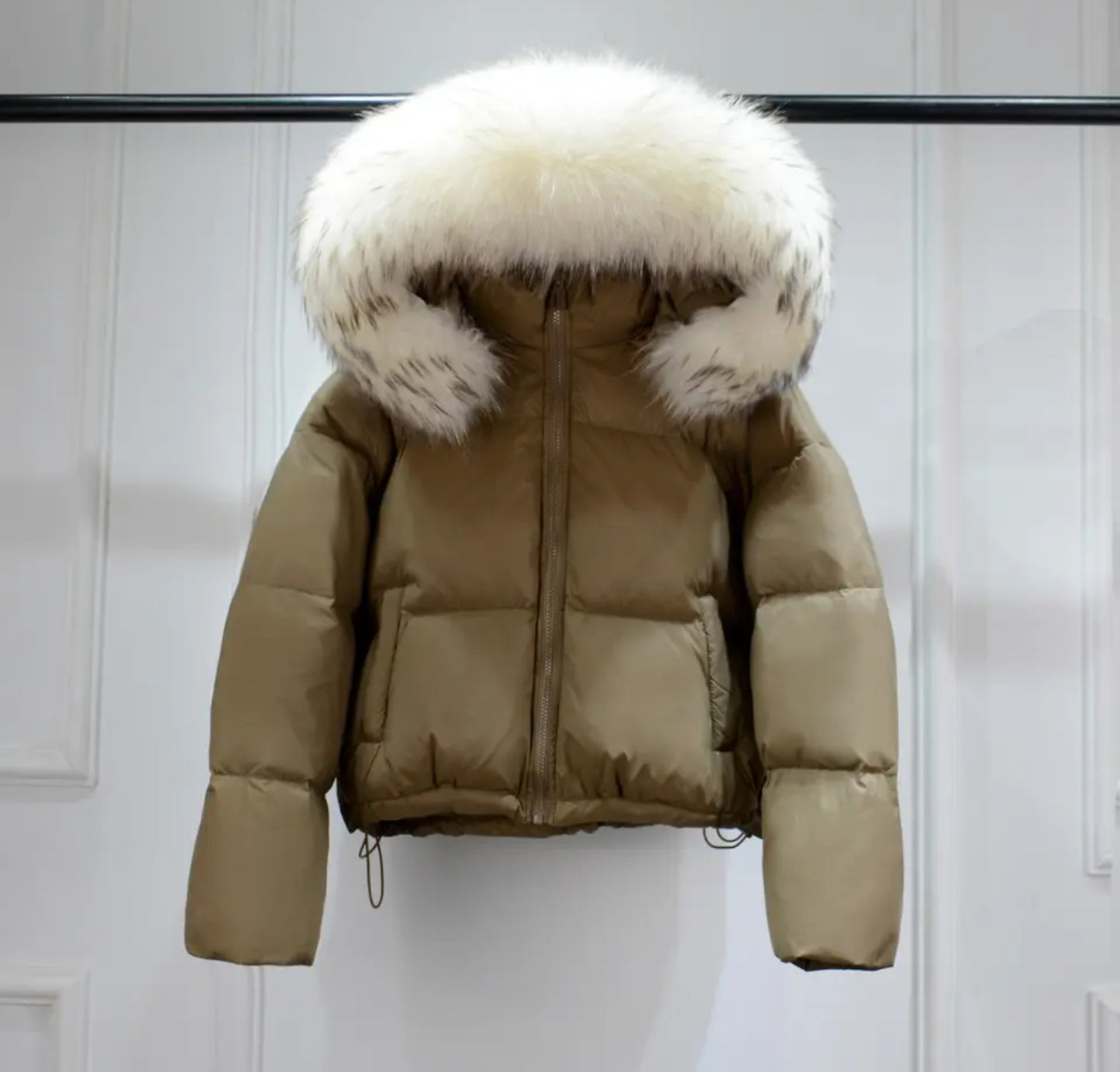 Luxury fur puffer coats .