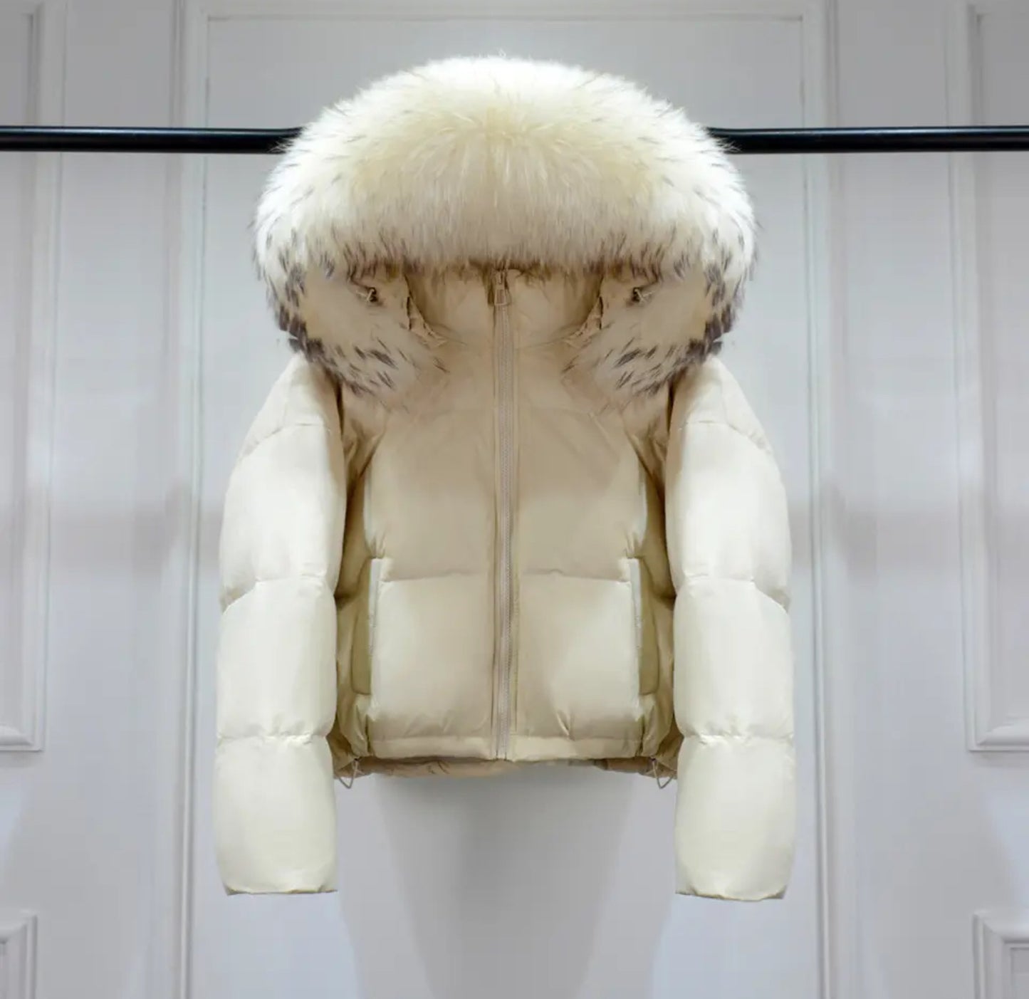 Luxury fur puffer coats .