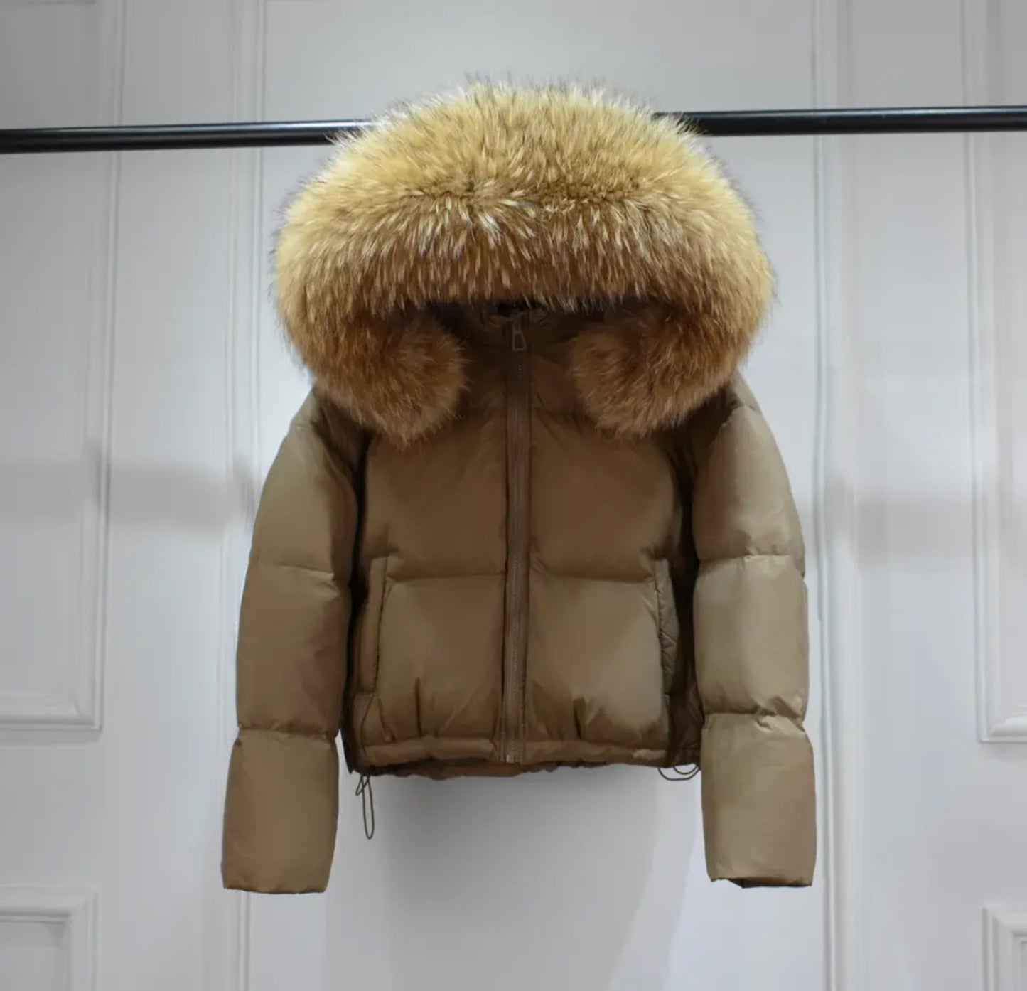 Luxury fur puffer coats .