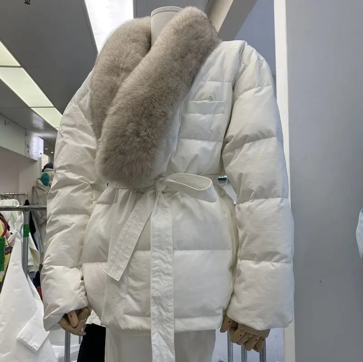 Winter fur puffer coat .