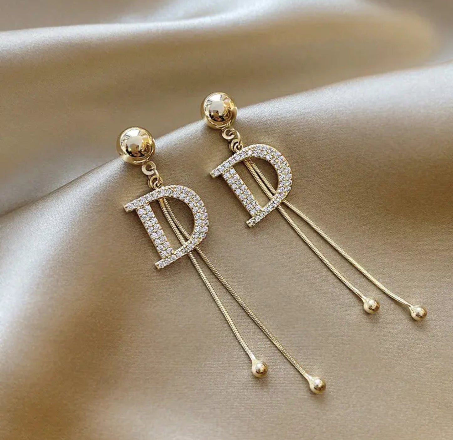 D INSPIRED EARRINGS. Accessories