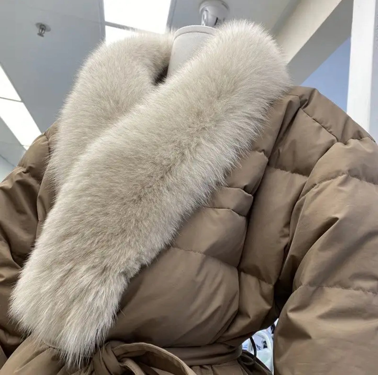 Winter fur puffer coat .