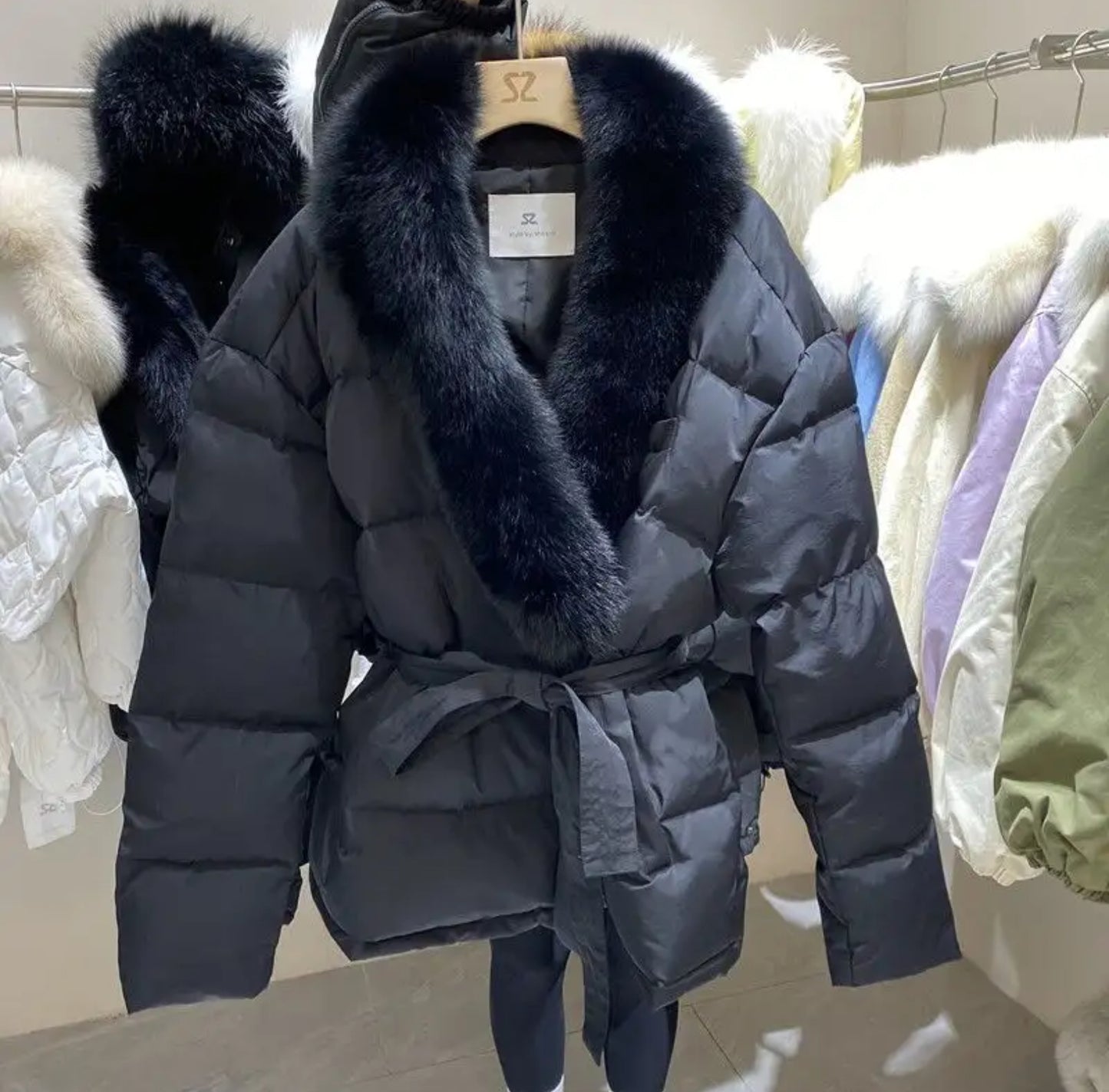 Winter fur puffer coat .