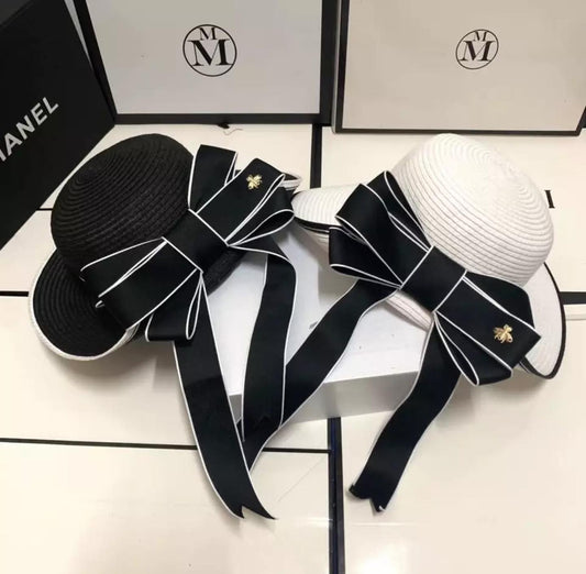 Luxury bow hats .    Accessories