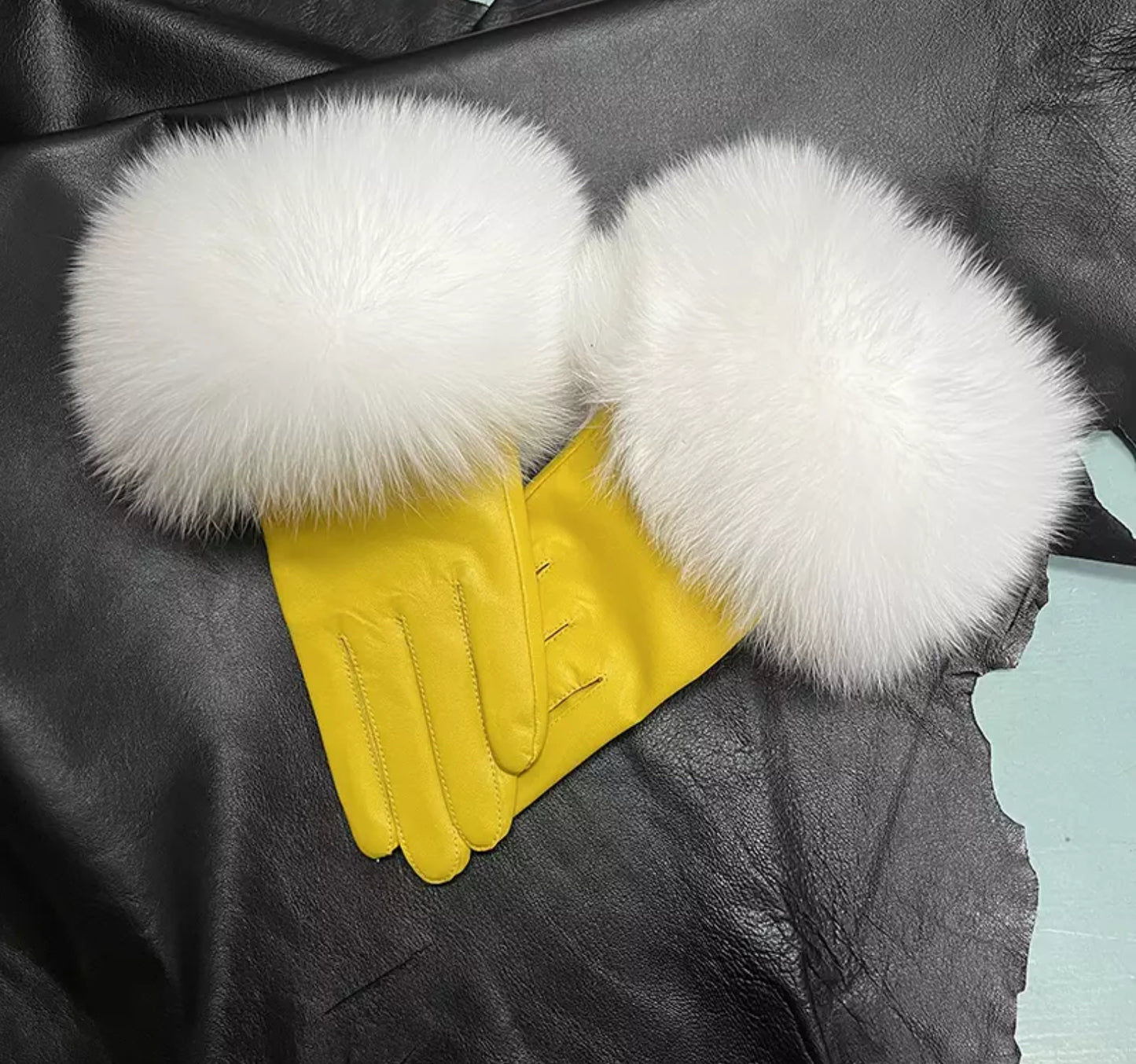 Luxury fur leather gloves .    Accessories