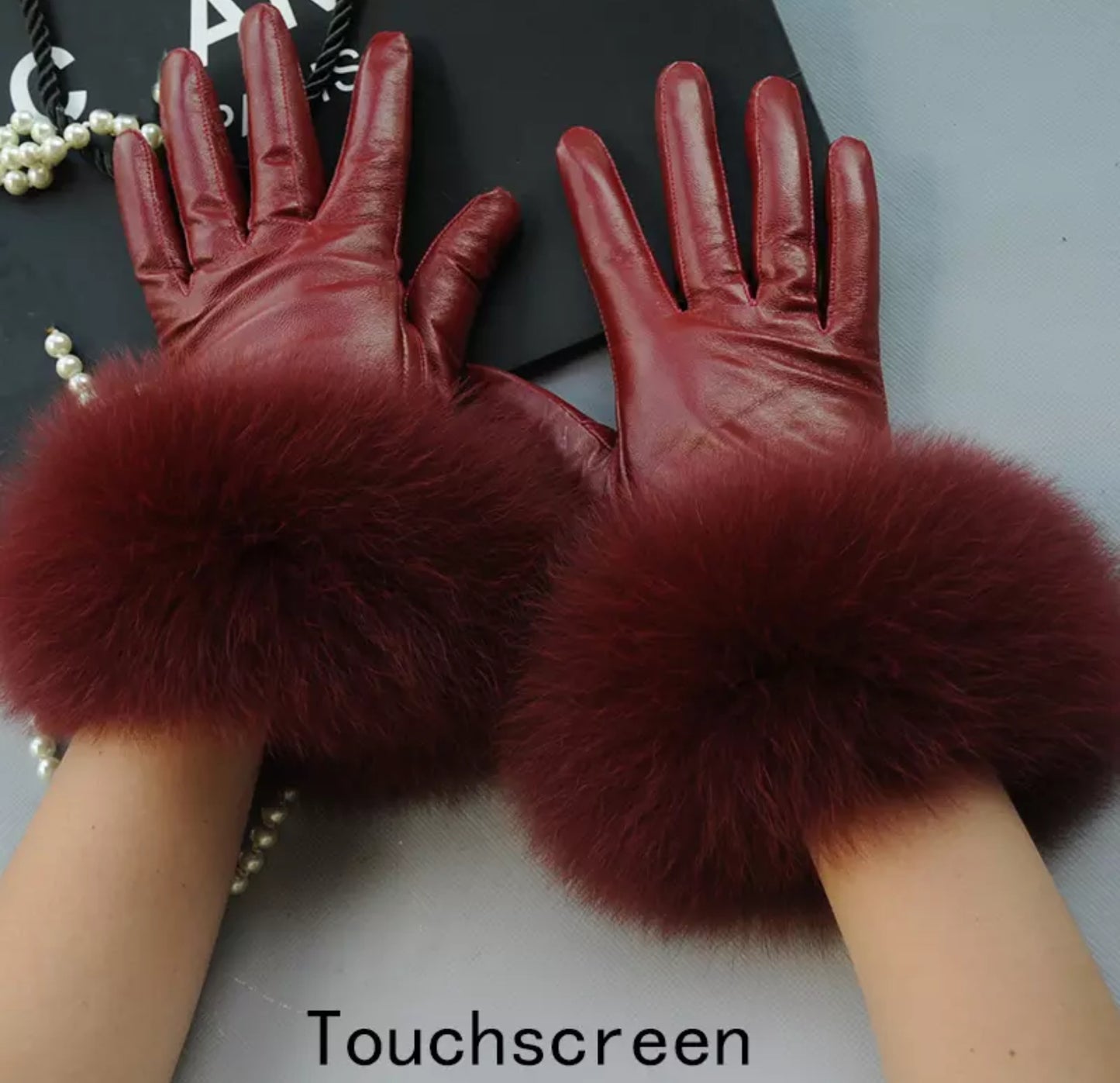 Luxury fur leather gloves .    Accessories