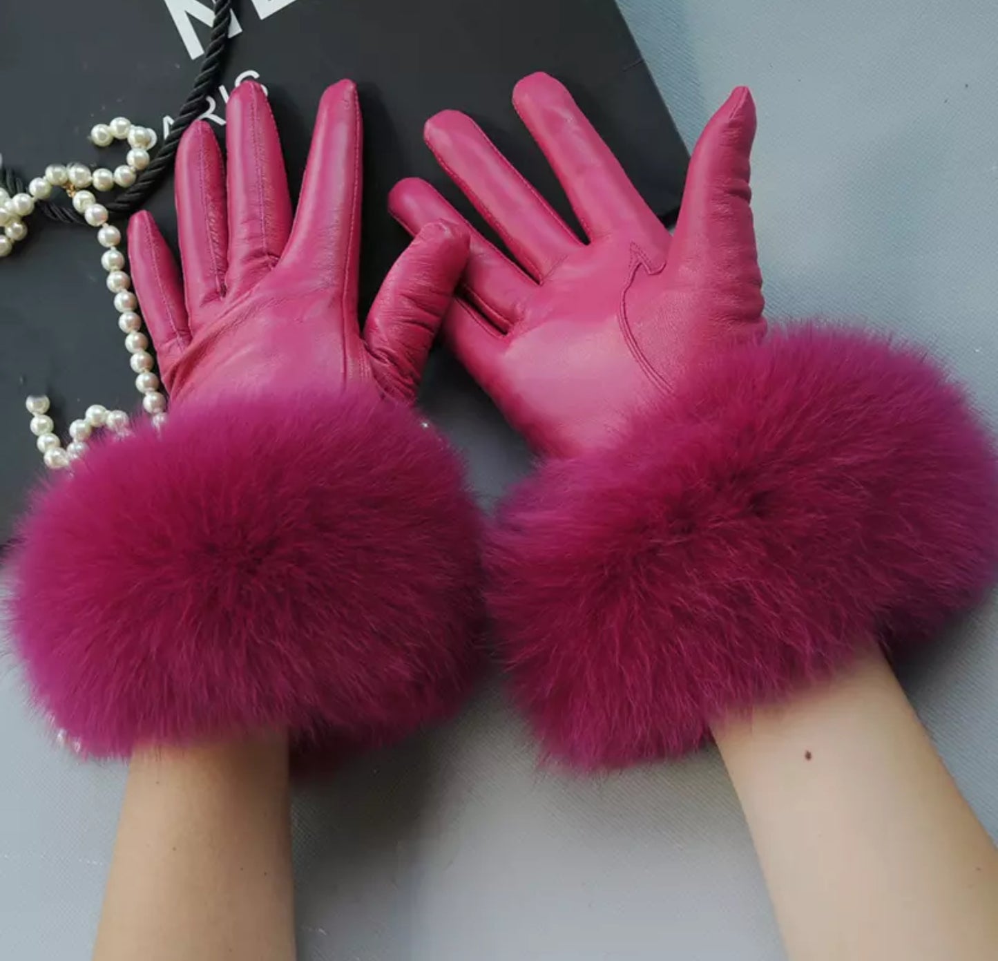 Luxury fur leather gloves .    Accessories