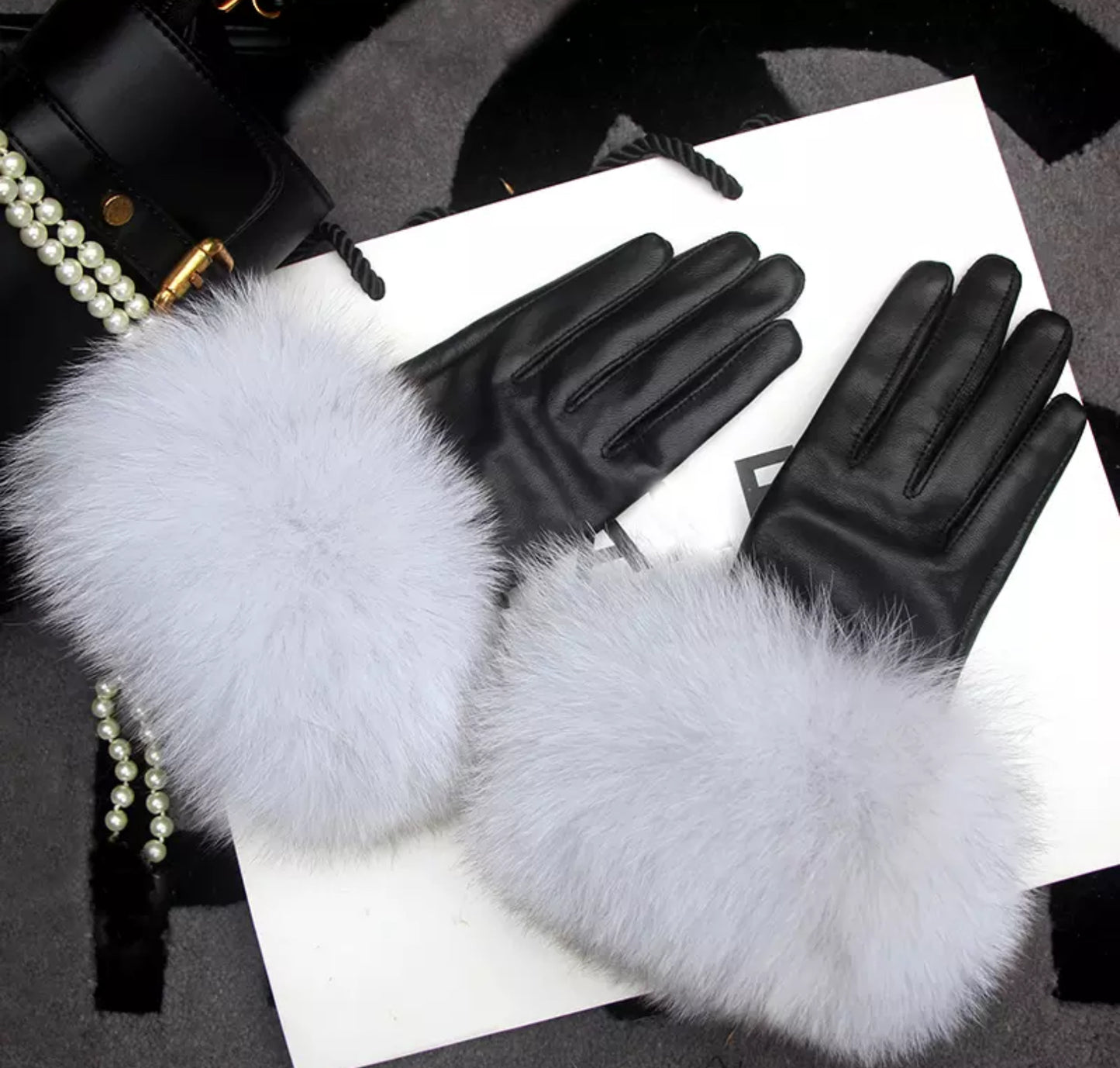 Luxury fur leather gloves .    Accessories