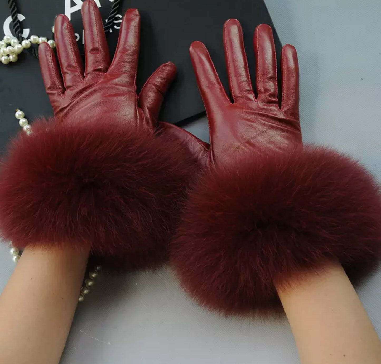 Luxury fur leather gloves .    Accessories