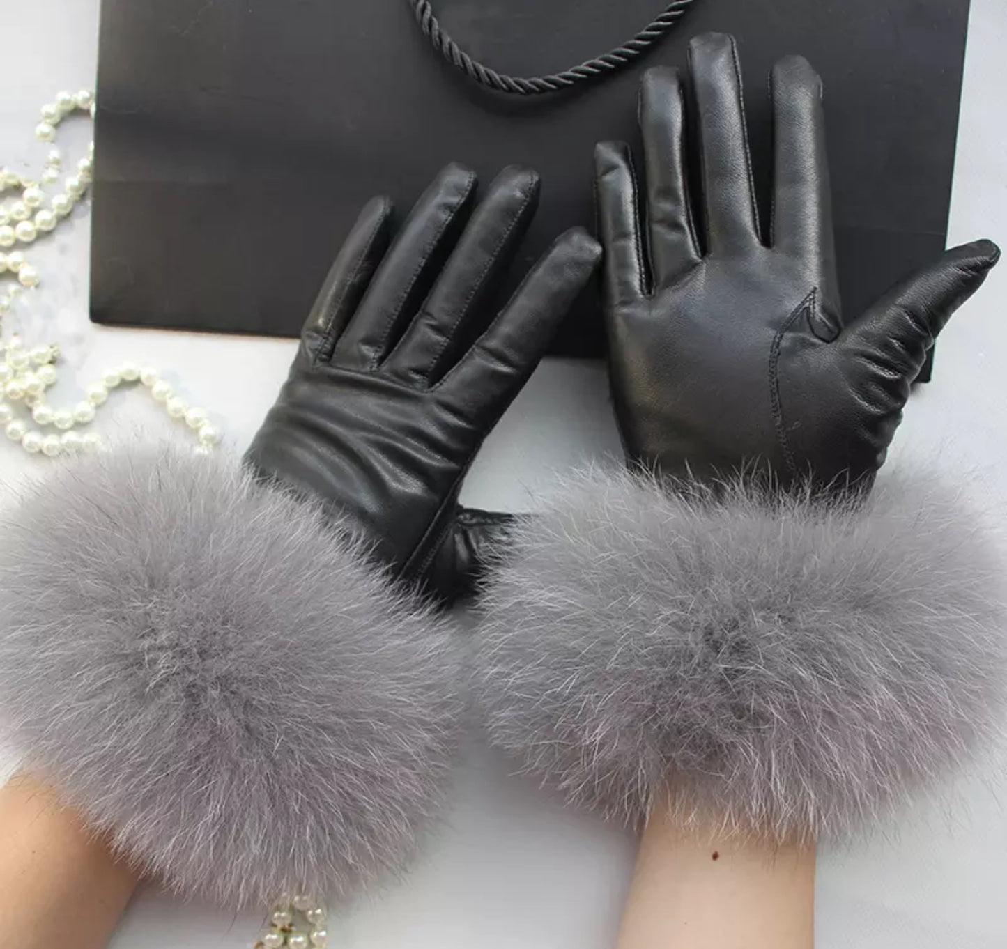 Luxury fur leather gloves .    Accessories