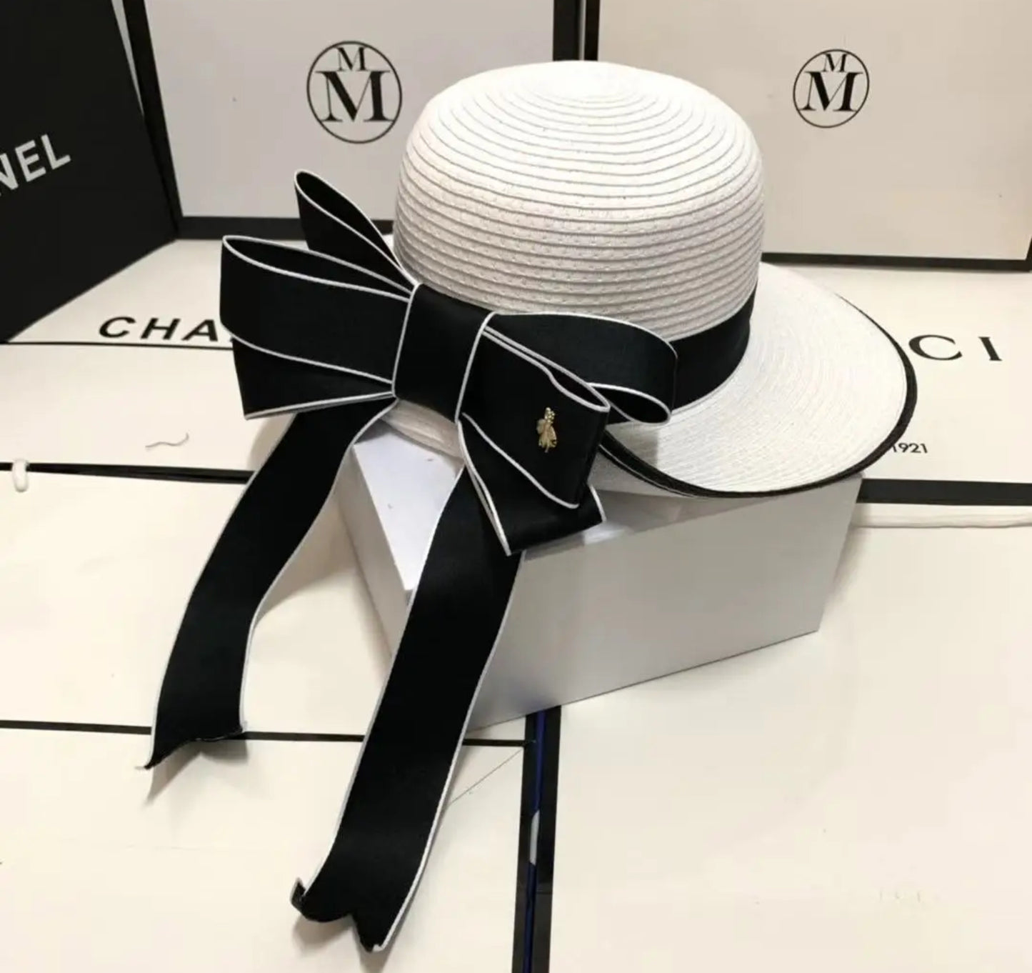 Luxury bow hats .    Accessories