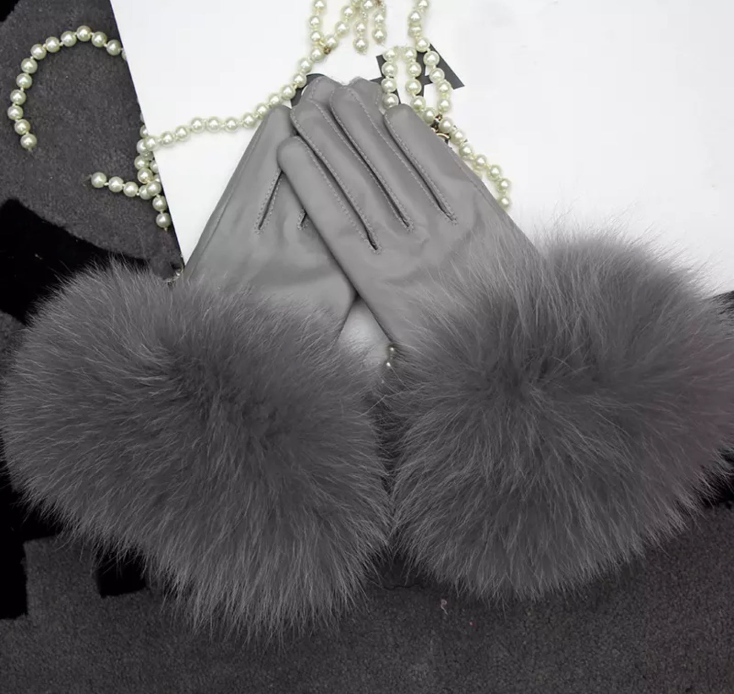 Luxury fur leather gloves .    Accessories