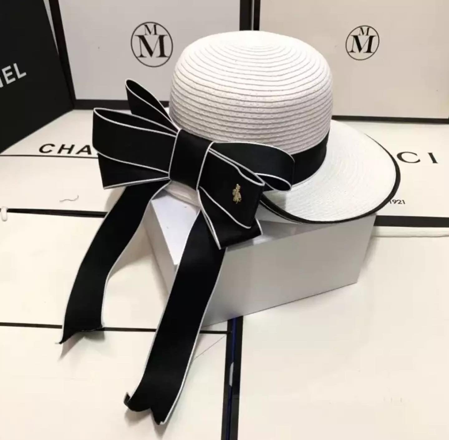 Luxury bow hats .    Accessories