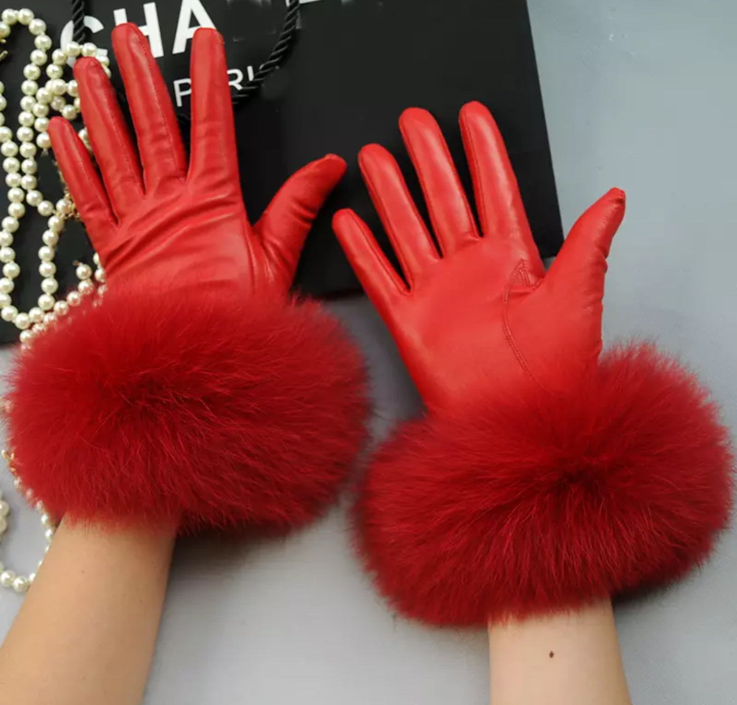 Luxury fur leather gloves .    Accessories