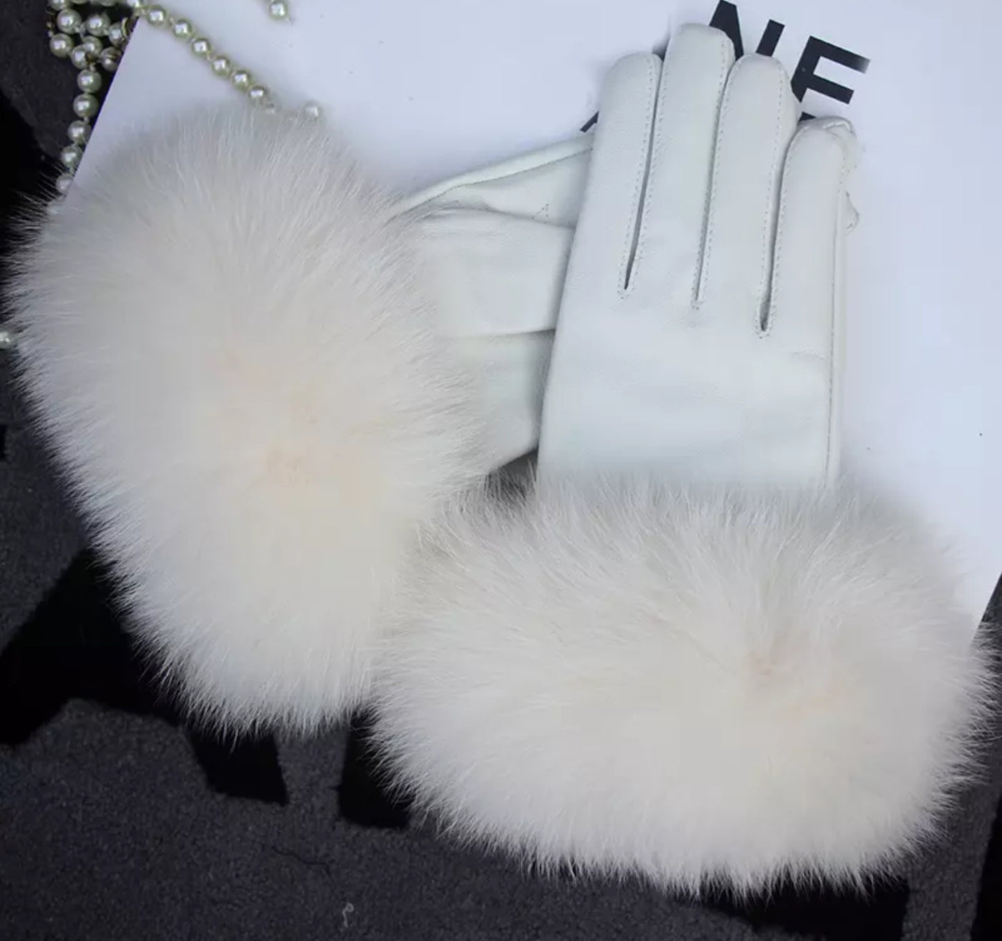 Luxury fur leather gloves .    Accessories