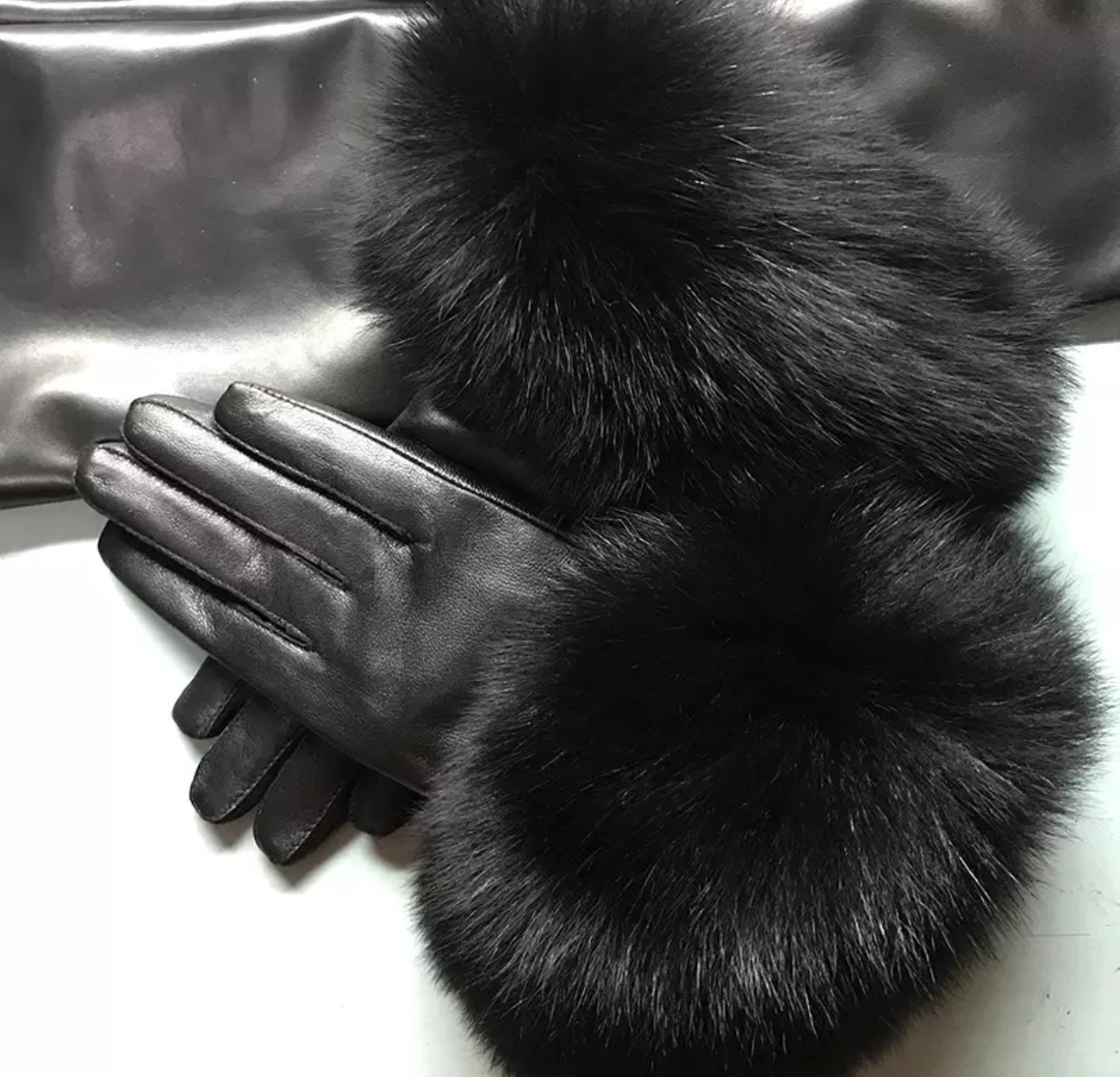 Luxury fur leather gloves .    Accessories