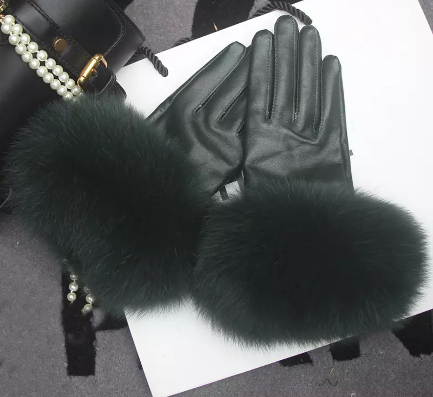 Luxury fur leather gloves .    Accessories